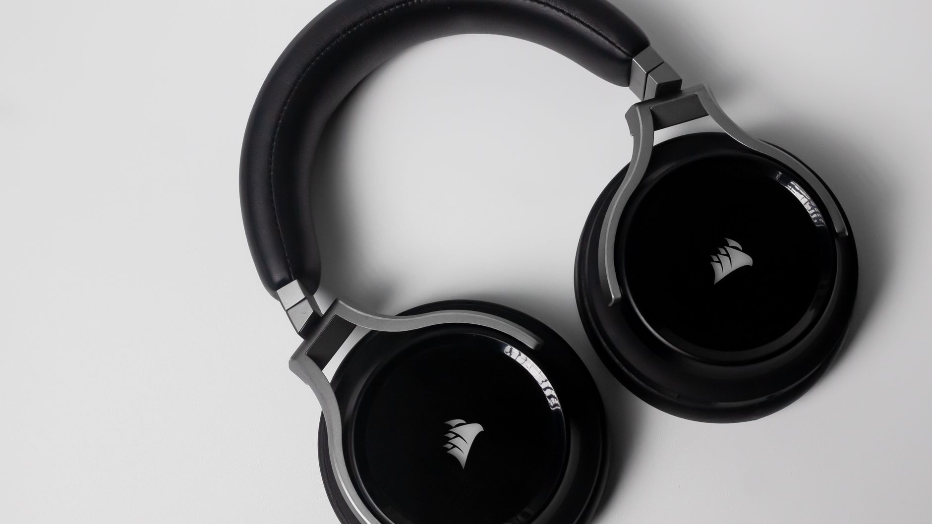 Stylish black over-ear wireless headphones on a clean white background.