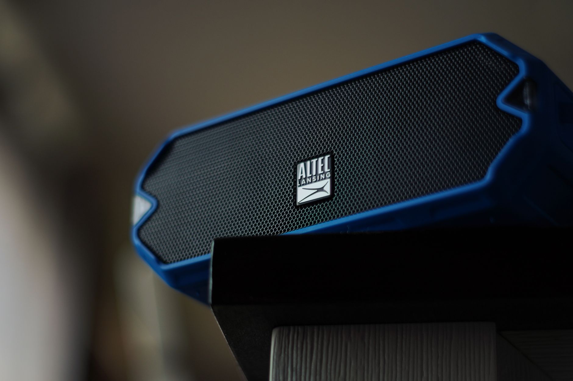 Close-up image of an Altec Lansing portable speaker with a focus on its grille design.