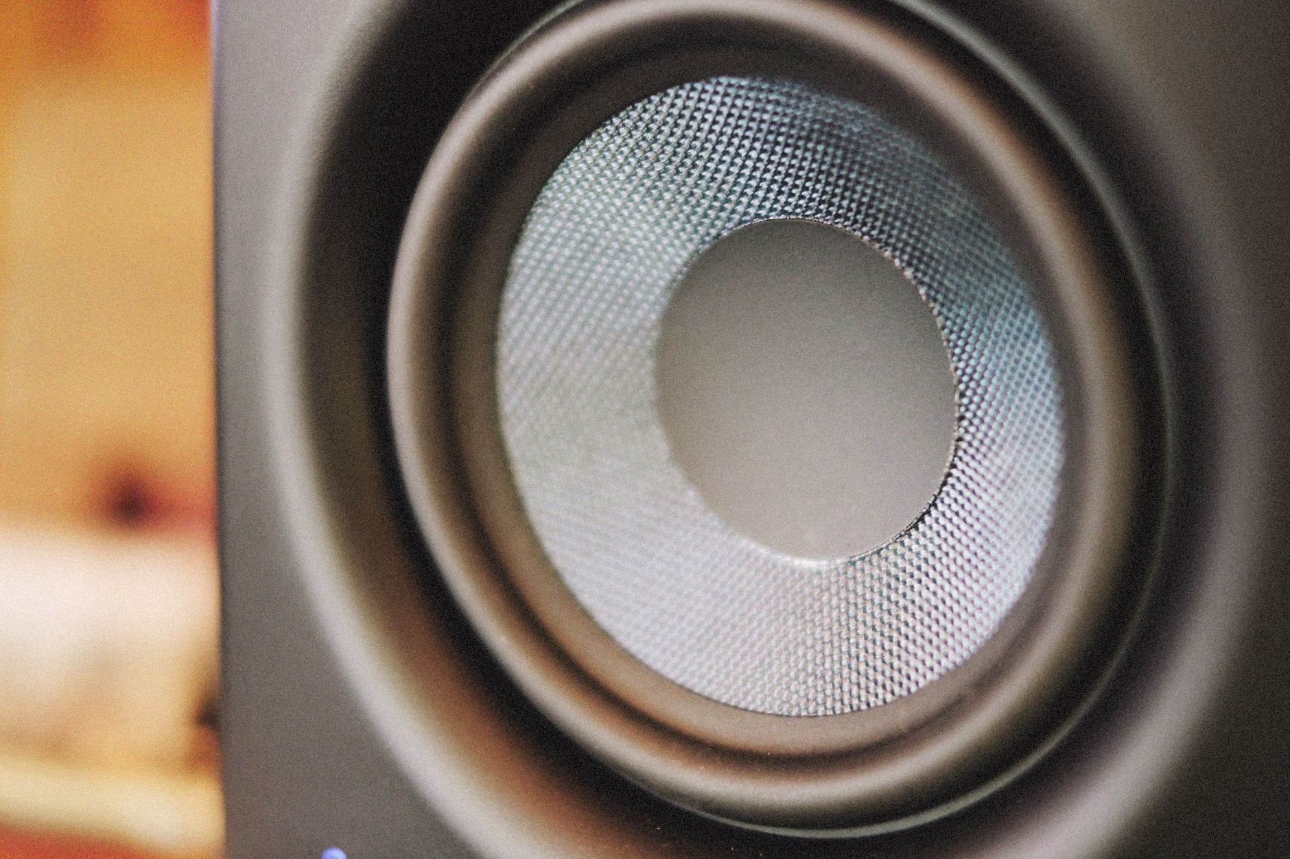 Detailed image of a modern speaker cone, highlighting audio technology and sound dynamics.